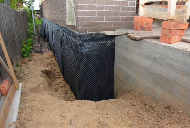Happy homeowners after waterproofing job in Clairfield